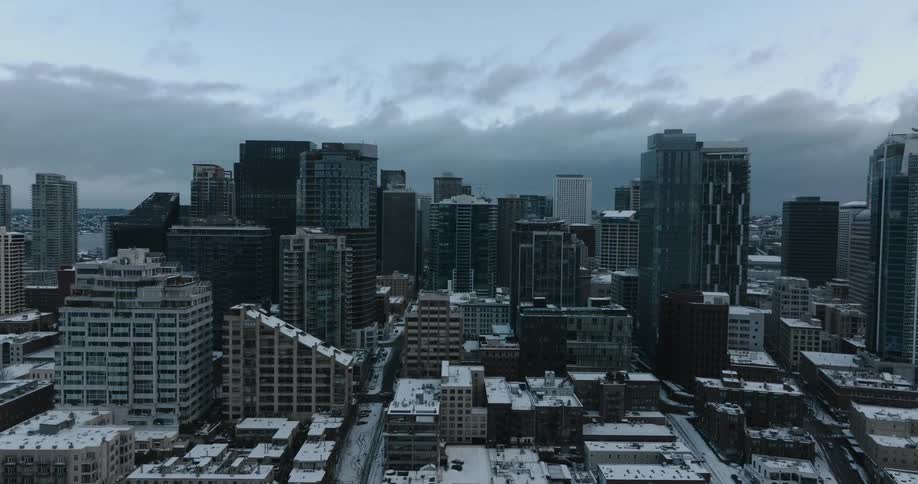 Snow covers city streets and roof tops in the downtown core