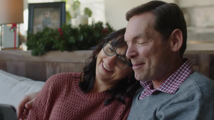 A man and woman have a video phone chat