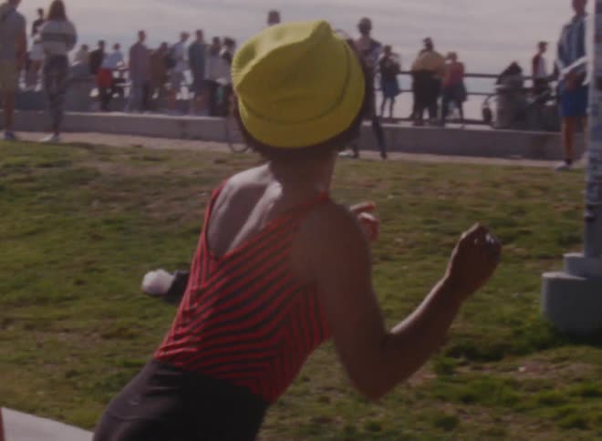 A woman dancing outdoors