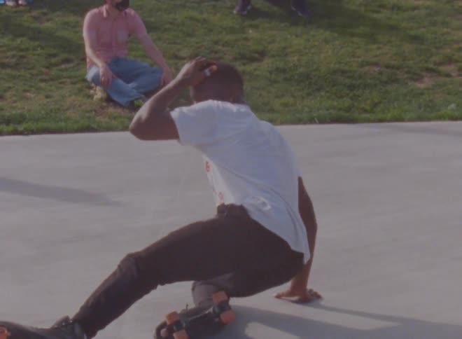 A view of a man dancing on skates