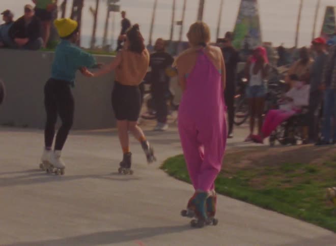 A view of people skating and dancing outdoors