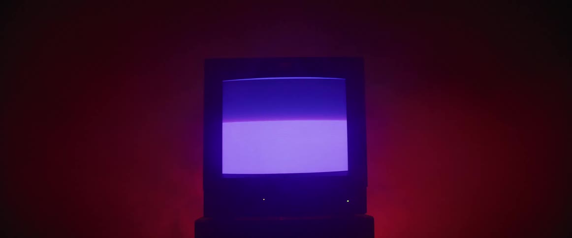 A computer display playing static with light flashing