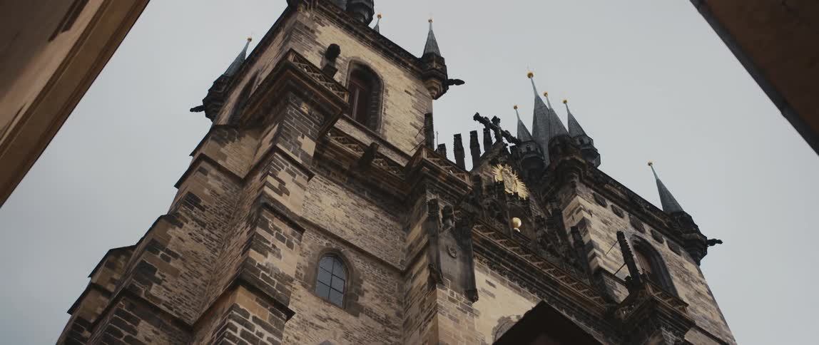 View looking up at the majestic spires of the Church of Our Lady before Tyn in Old Town Square, Prague, Czech Republic.