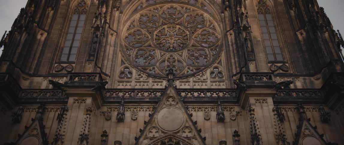 View panning up from the entrance doors to majestic spires of Saint Vitus Cathedral in Prague Castle Complex, Czech Republic