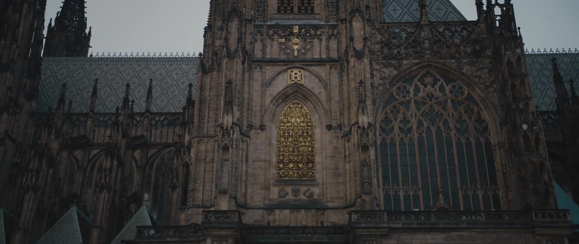 View panning down from the clock tower of St. Vitus Cathedral in Prague Castle complex, Czech Republic