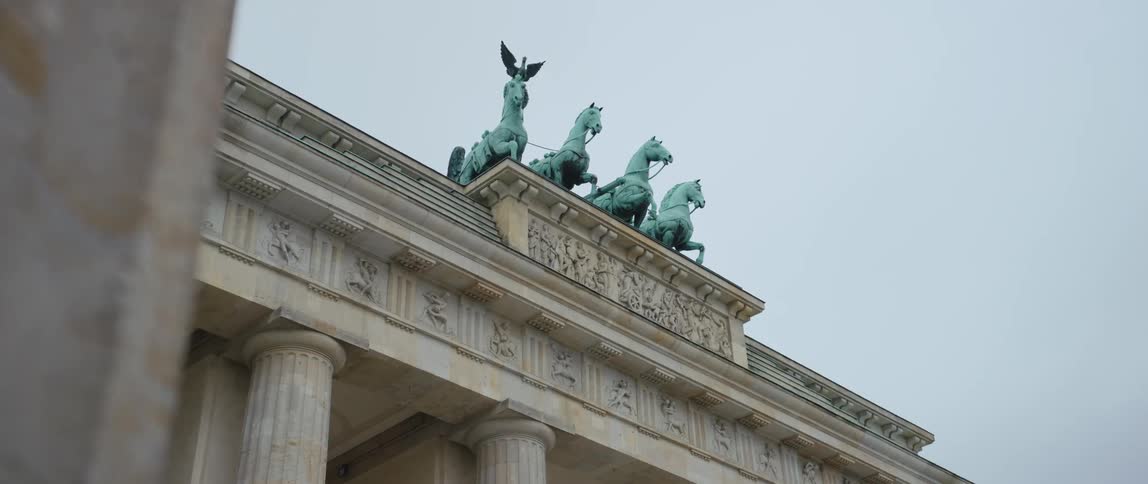 The Berlin quadriga of four horses drawing a chariot ridden by Victoria, the goddess of victory.