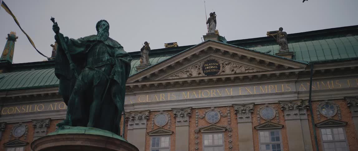 A view of a statue outside of a building