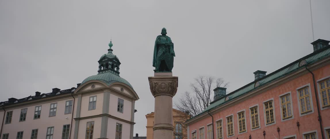 Buildings near the statue in memory of birger jarl the founder of the city at riddarholmen square in stockholm sweden