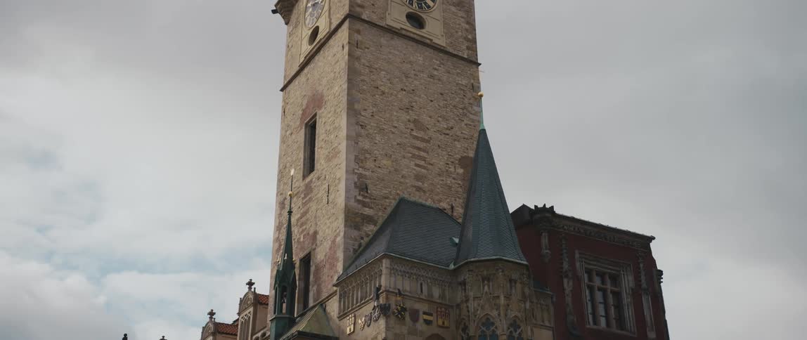 The spired tower of the medieval Astronomical Clock attached to the Old Town Hall in Prague, Czech Republic