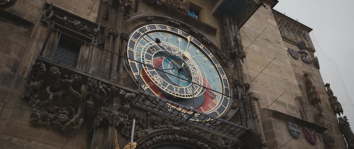 View up to the Astronomical Clock, including zodiacal ring with sun and moon positions, on the Old Town Hall, Prague, Czech Republic