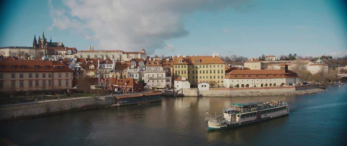 A view of a boat next to a city