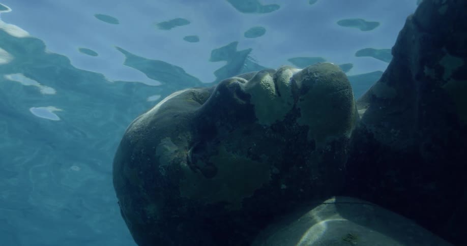 Marble sculpture of man underwater