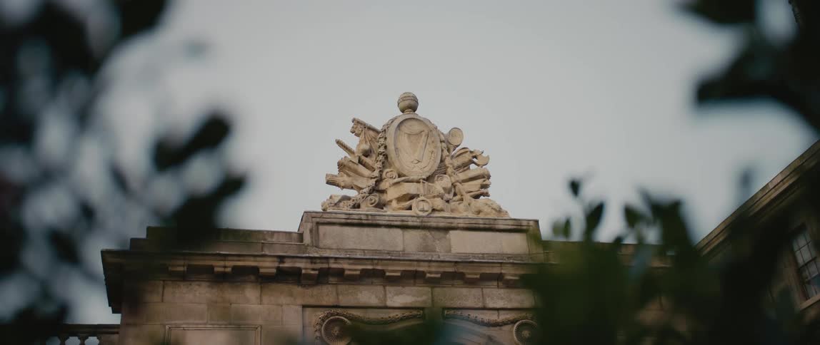 A sculpture of the Coat of Arms of Ireland's four provinces on the Four Courts Building in Dublin, Ireland