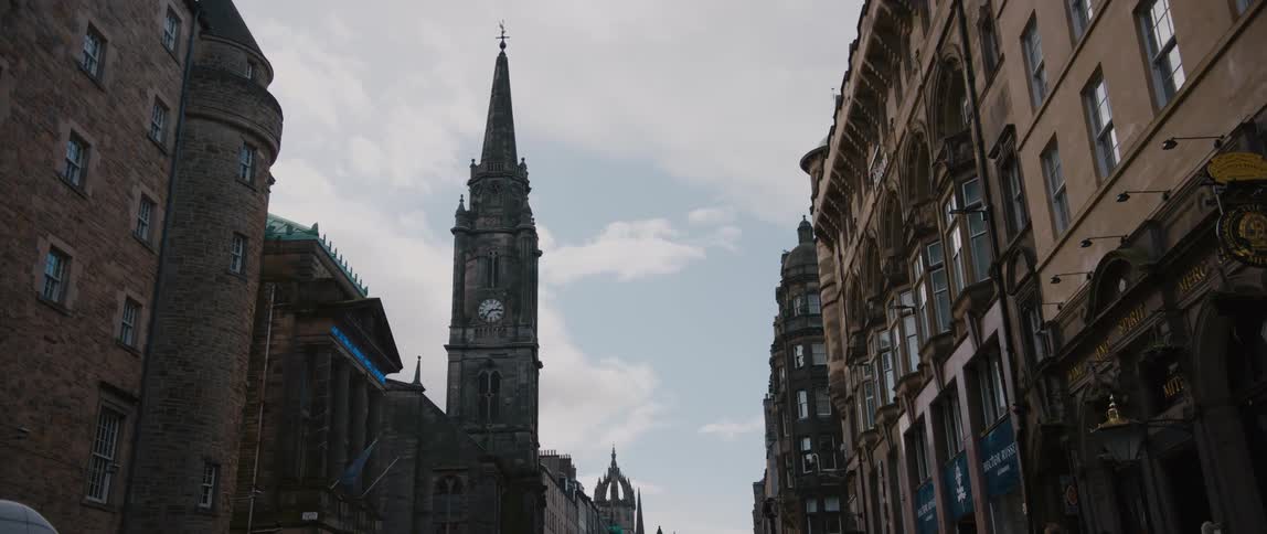 Tron Kirk church tower with St. Giles in the background seen from the street below in Edinburgh, Scotland, United Kingdom