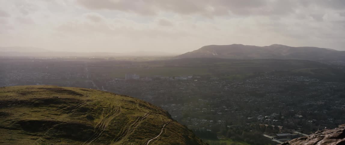 View from a high elevation of Edinburgh, Scotland, United Kingdom with mountains in the background