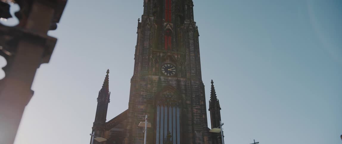 The clock tower of the The Hub/former Highland Tollbooth Church in Edinburgh, Scotland, United Kingdom