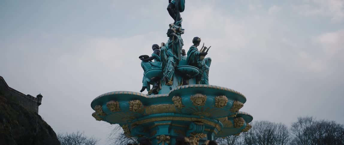 An elaborate painted sculpture outdoors during the day