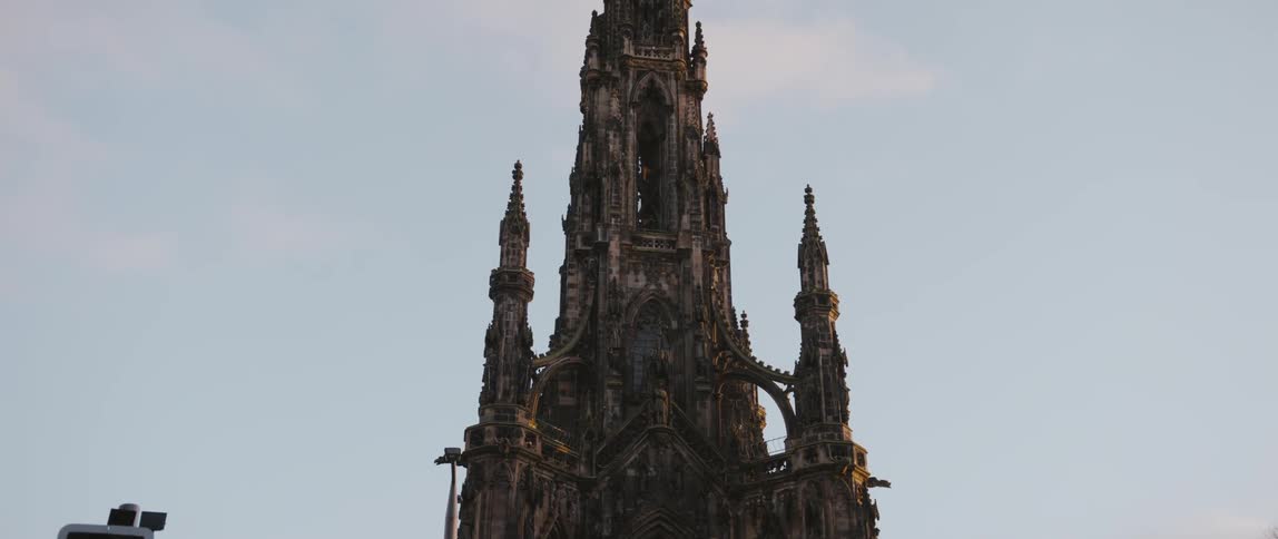 The elaborate facade and ornate spires of the Scott Monument in Edinburgh, Scotland, United Kingdom