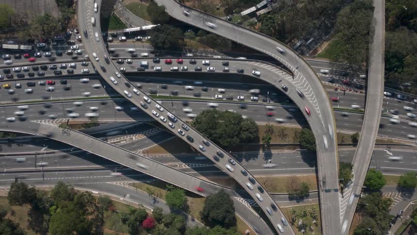 A bird's eye view hyperlapse of traffic on a highway