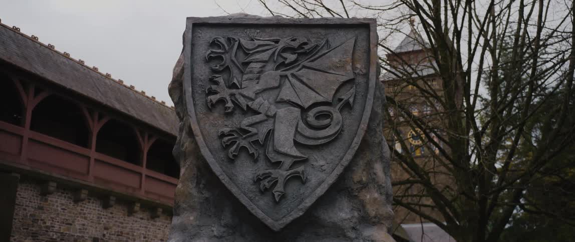 A dragon on monument outside a building