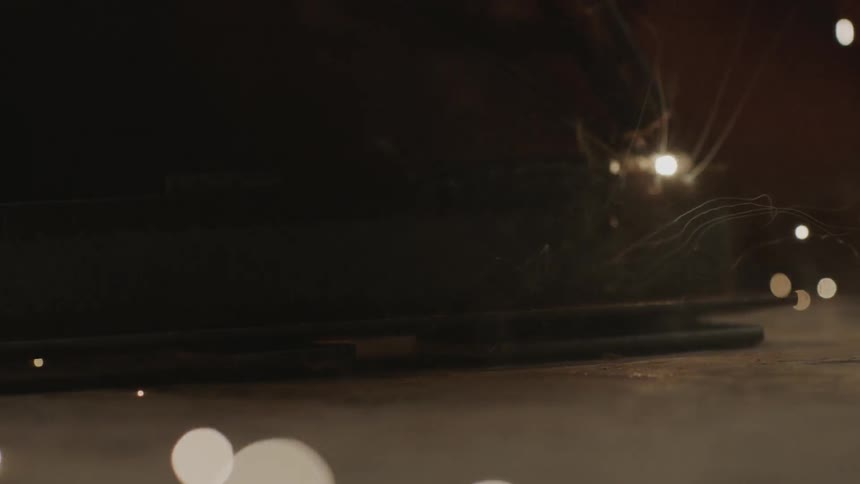 Sparks fly from a welder