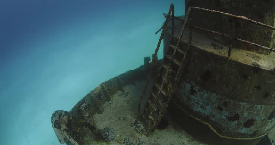 The ruins of a sunken ship are lying on the seabed