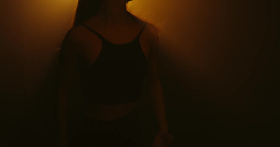 A woman dancing indoors