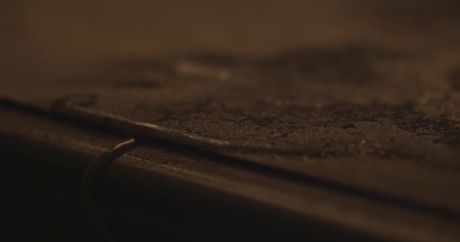Water pours slowly off of a table