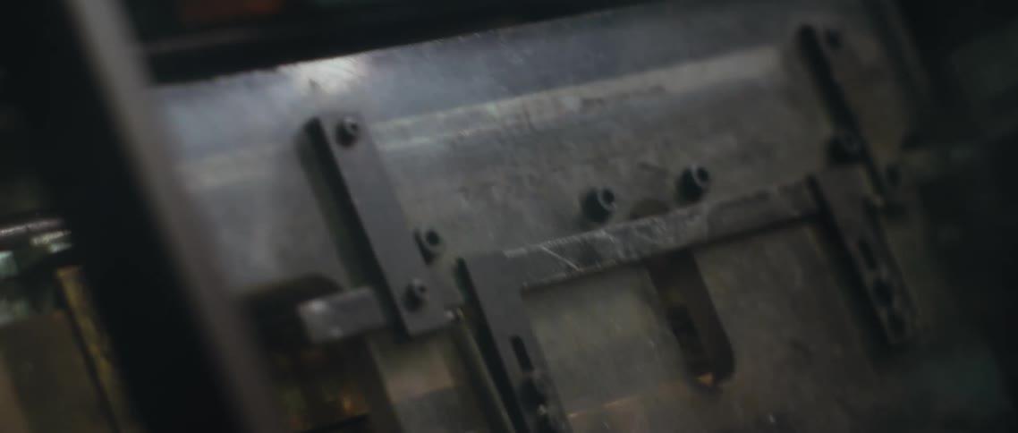 Machine impresses ripple effect onto surface during manufacturing process