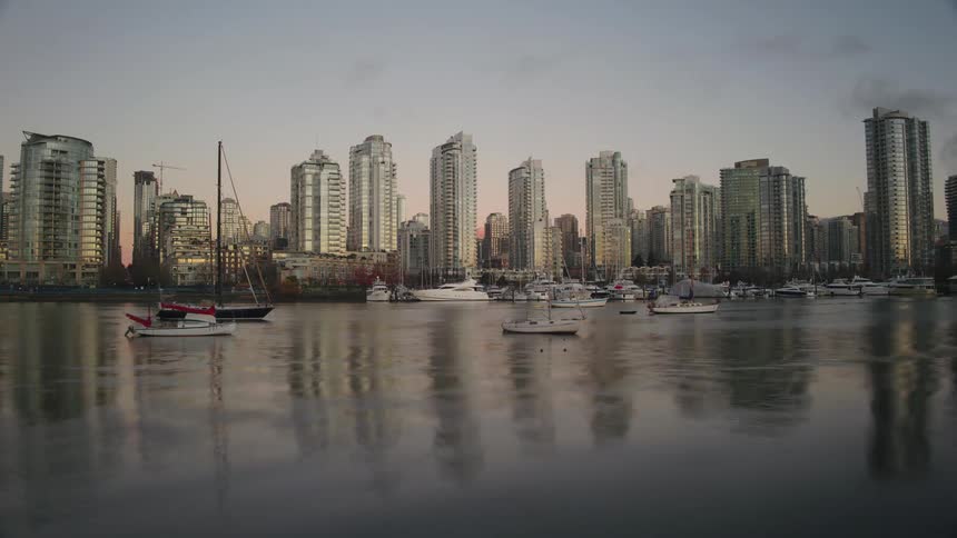 Boats in Vancouver's False Creek at sunrise