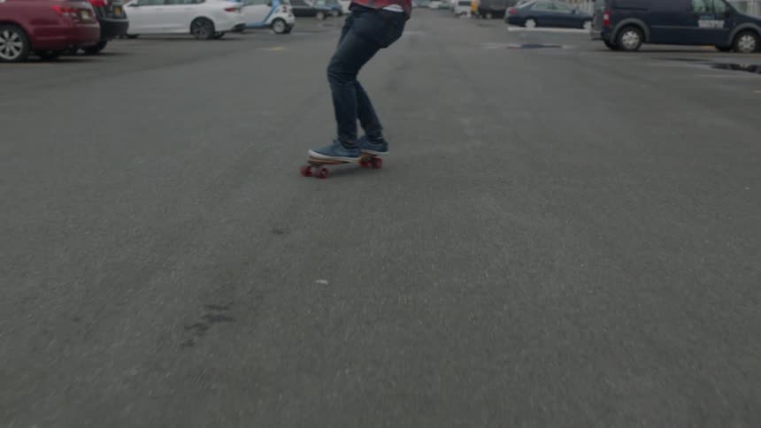 Person skateboarding on a city street
