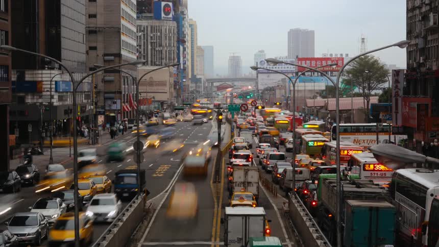 Heavy traffic and pedestrians timelapse in Taipei Taiwan