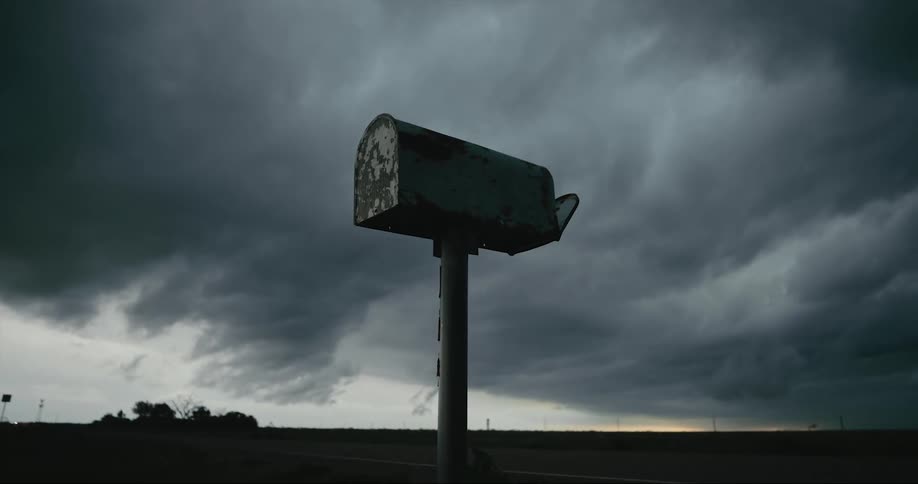 Close up view of a mail box in a rural area is displayed