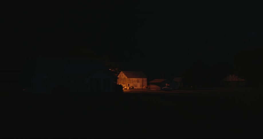 Its storming in a neighborhood at night