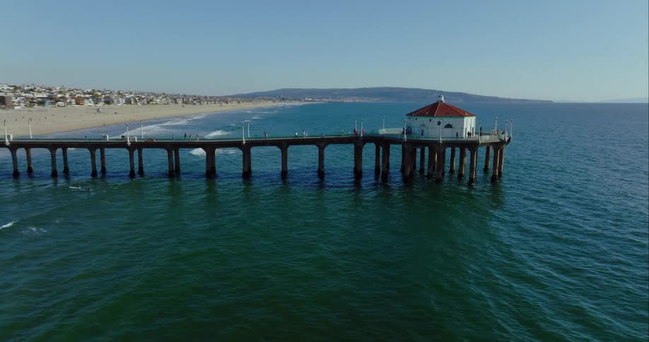 Aerial view of ocean and the beach is displayed