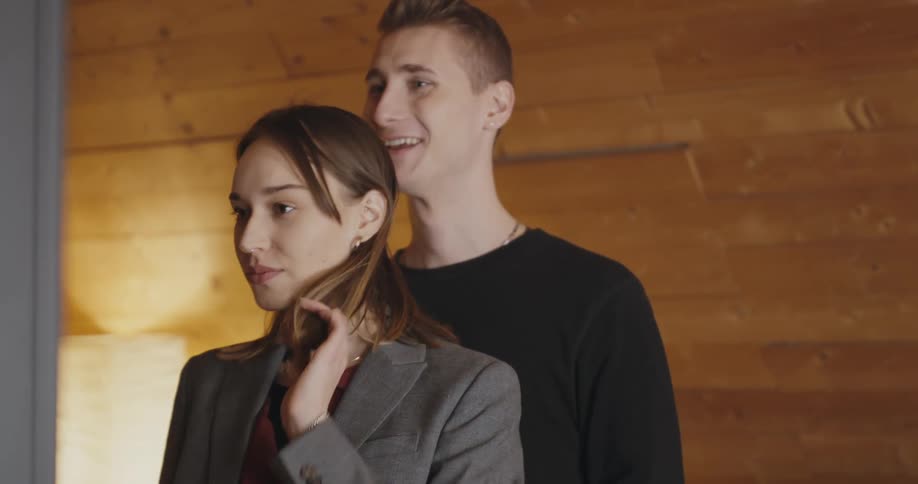 A boyfriend and girlfriend kissing each other