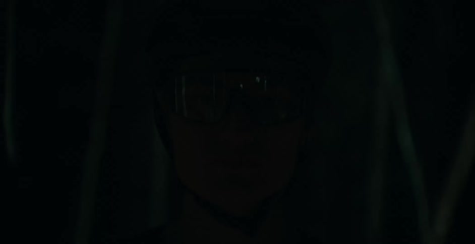A view of a person with a helmet on