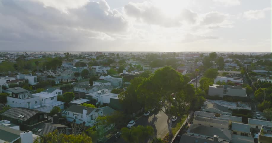 An aerial view of buildings and homes in a town