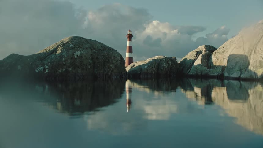 A lighthouse on the coast reflected in rippling water