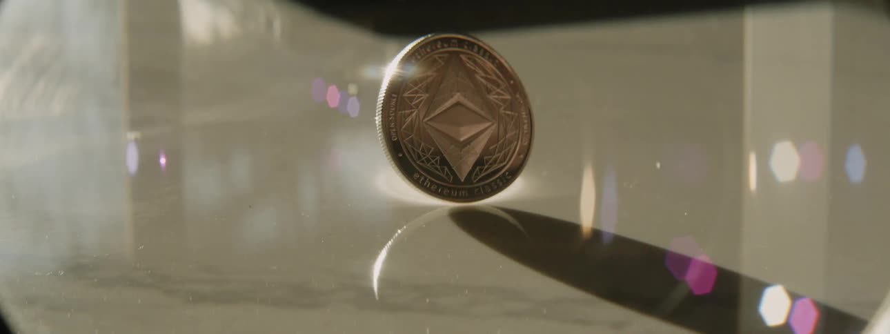 A view of a coin spinning on a table