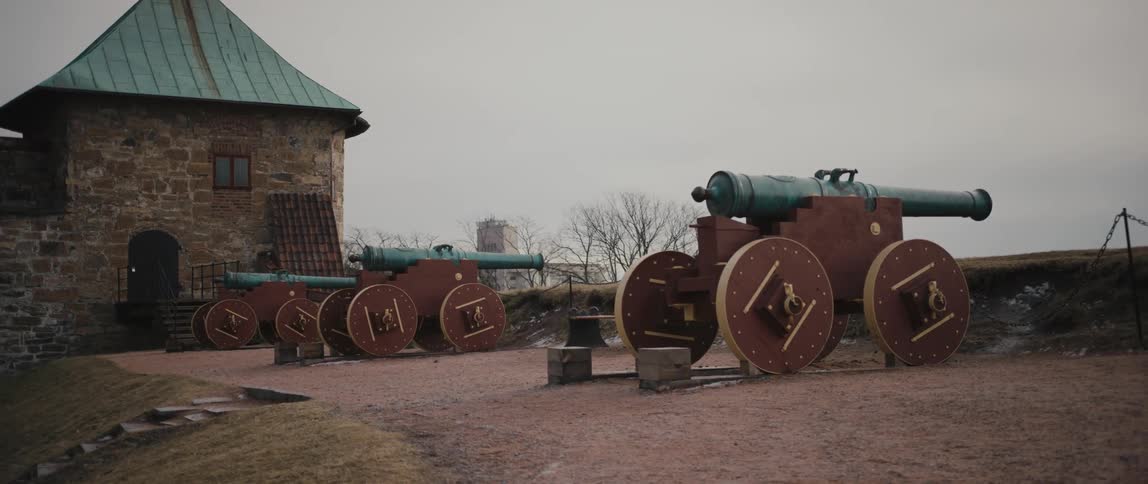 Three cannons on a ledge of Akershus Castle overlooking the Oslo Fjord in Oslo, Norway