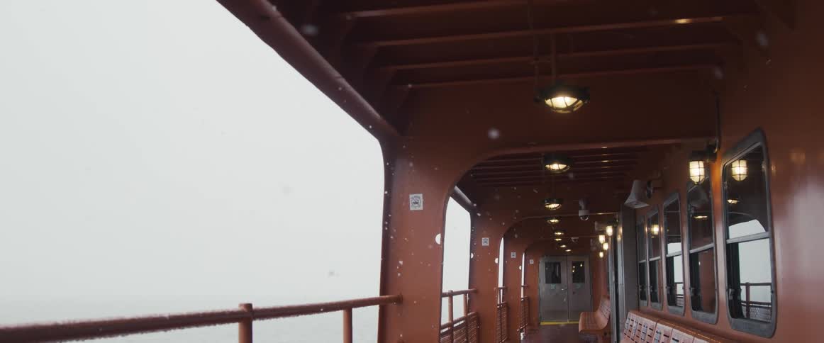 It is snowing around the ferry