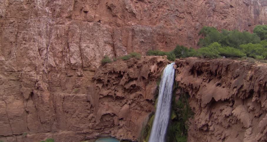 View of a mountain with a waterfall on one ledge