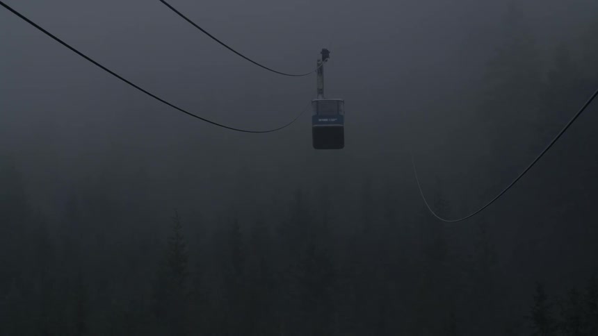 A cable car in the clouds