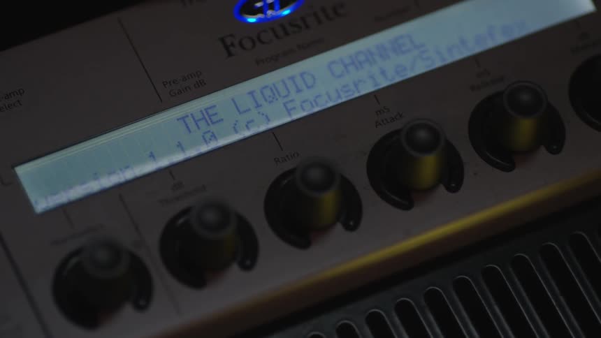 Close up of some lit knobs and an lcd on a device