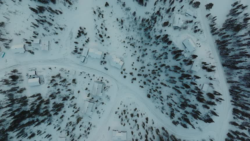 The rural town is covered in snow