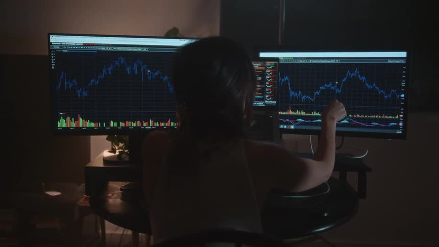 A person looking at a computer screen