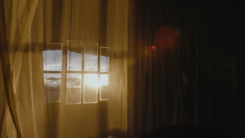 A large curtain is on the wall