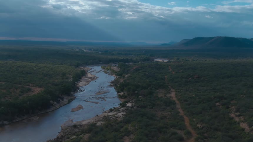 Aerial view of river across land