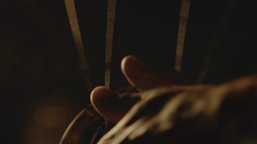 A view of a wheel rotating in hands